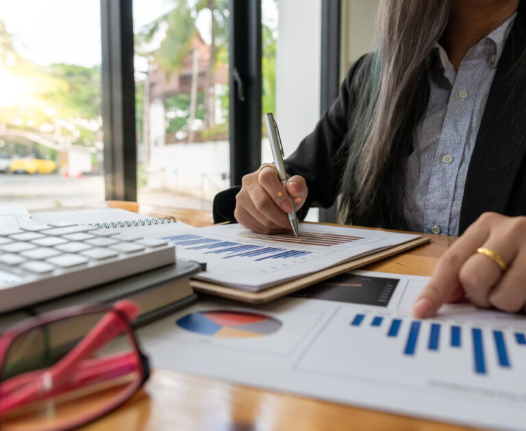 a female accountant working on catch-up bookkeeping