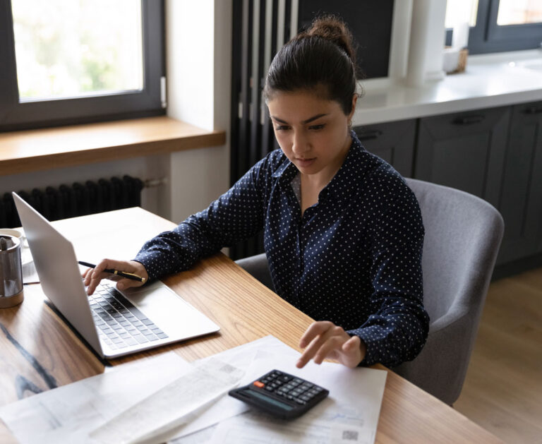 A female accountant preparing annual financial reports